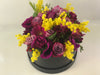 Flowerbox con fiori di stagione e mimosa